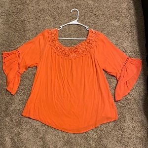 Coral Top with embroidered around the shoulders